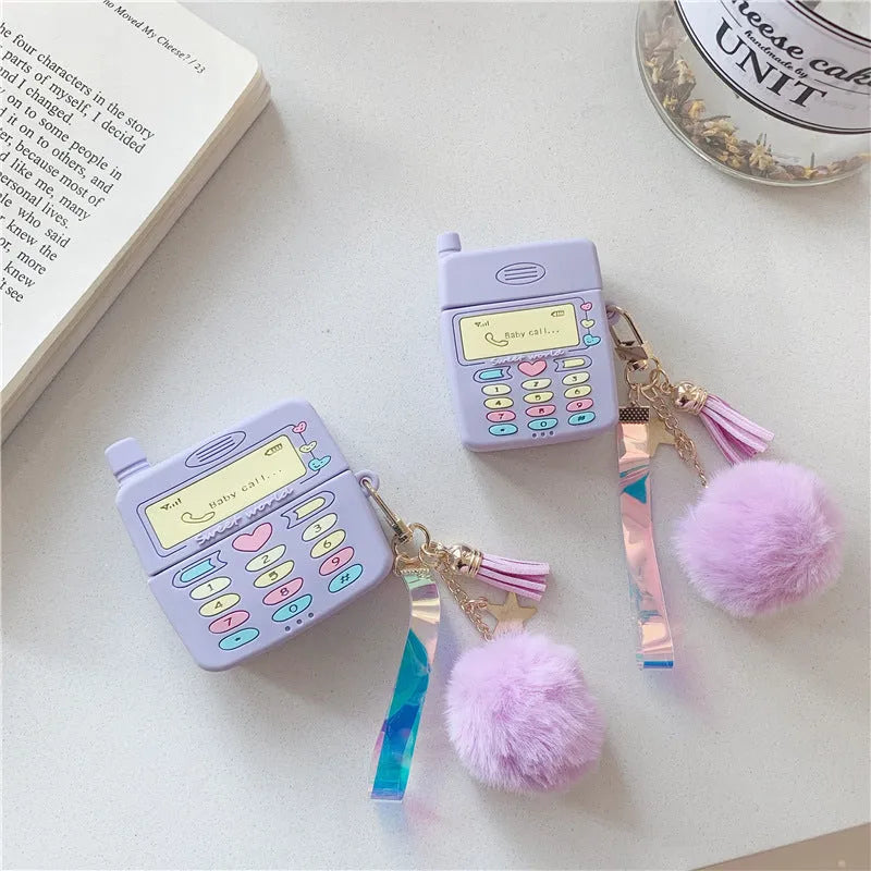 Purple silicone protective case for Apple AirPods with detachable fur ball pendant accessory
