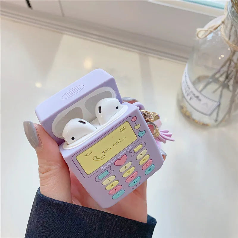 Purple silicone protective case for Apple AirPods with detachable fur ball pendant accessory