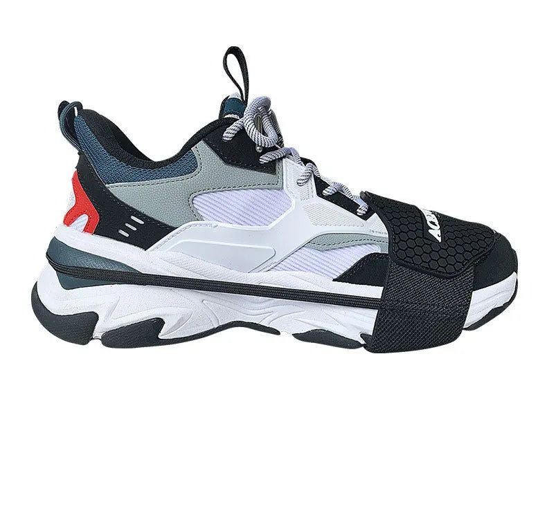Black rubber motorcycle shift pad with anti-slip silicone and adjustable hook and loop fastening on a boot.