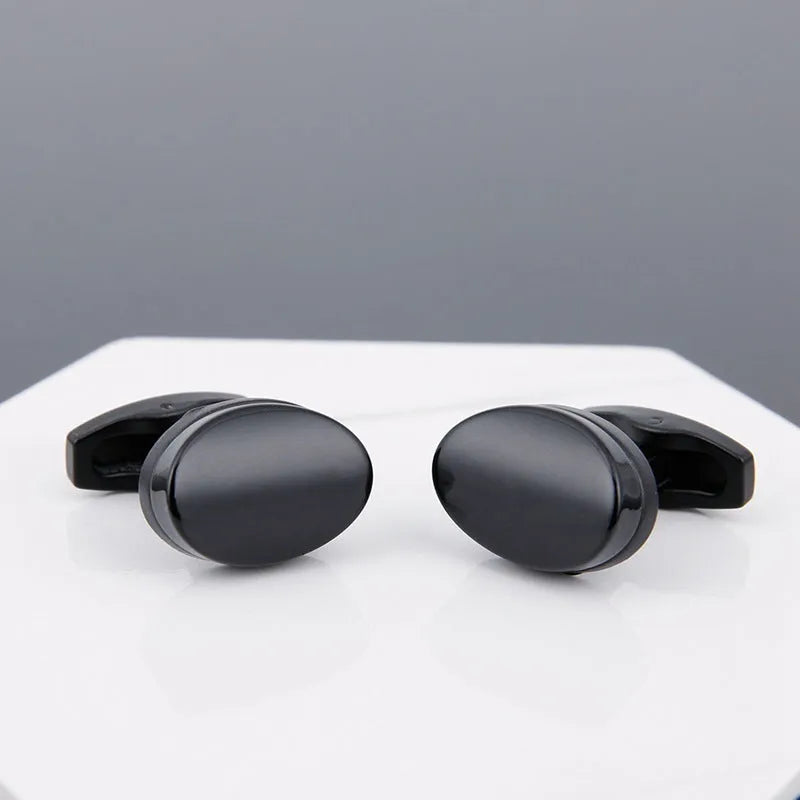 Men's copper cufflinks with black face, grey electroplated geometric design and sleeve stud fitting