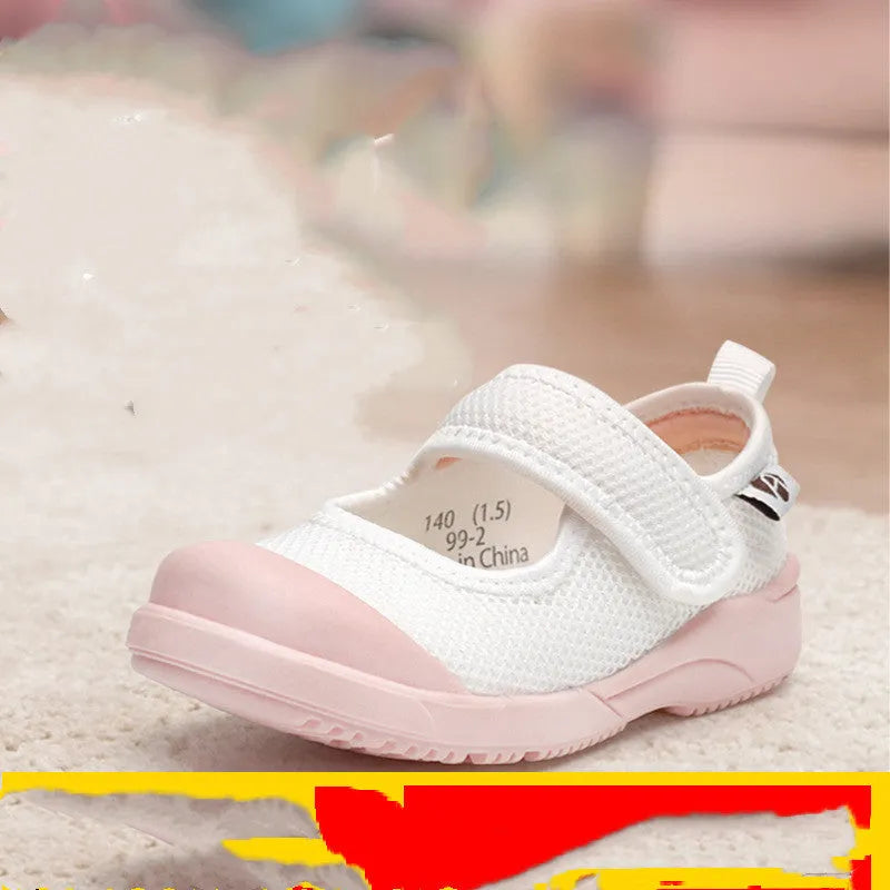 White and pink children's cloth shoes with mesh uppers and Velcro fastening