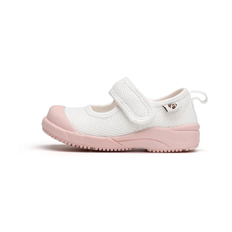 White and pink children's cloth shoes with mesh uppers and Velcro fastening