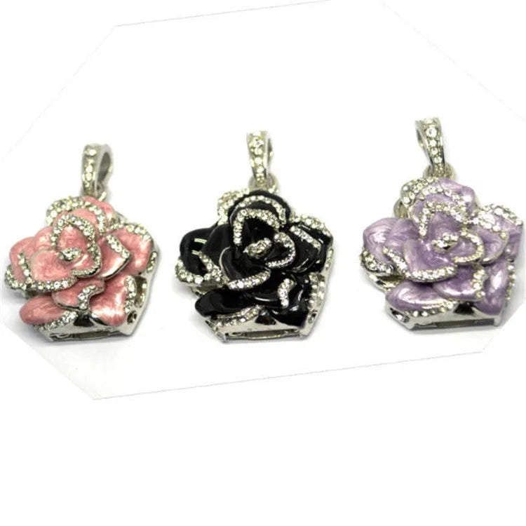Diamond-studded metal rose USB flash drive with rhododendron crystal design in blue, purple or red.