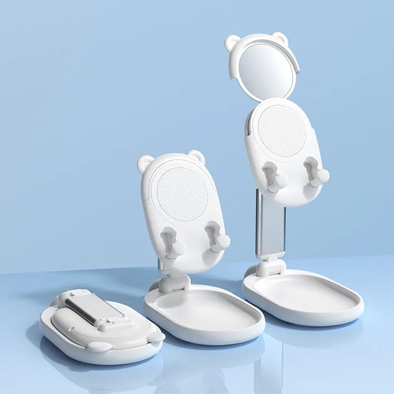 Blue foldable phone holder with mirror for Apple iPhone and iPad on a desk