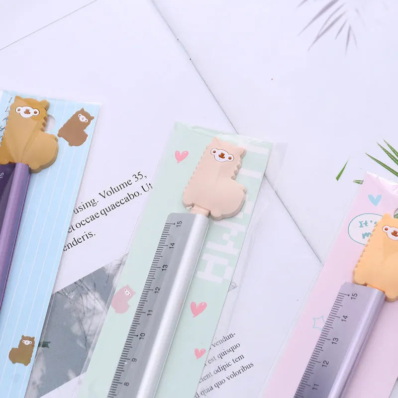 Silver 30 cm aluminium ruler with centimetre and inch scales, showing cork backing on reverse.