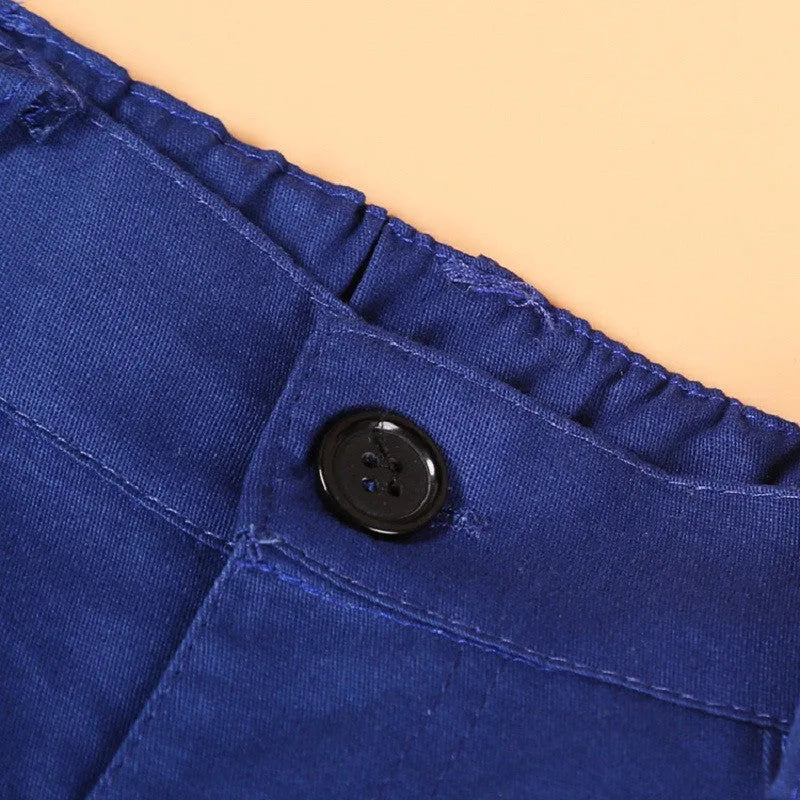 Blue boys' three-piece suit set with turtleneck, vest, trousers, and tie on a hanger.