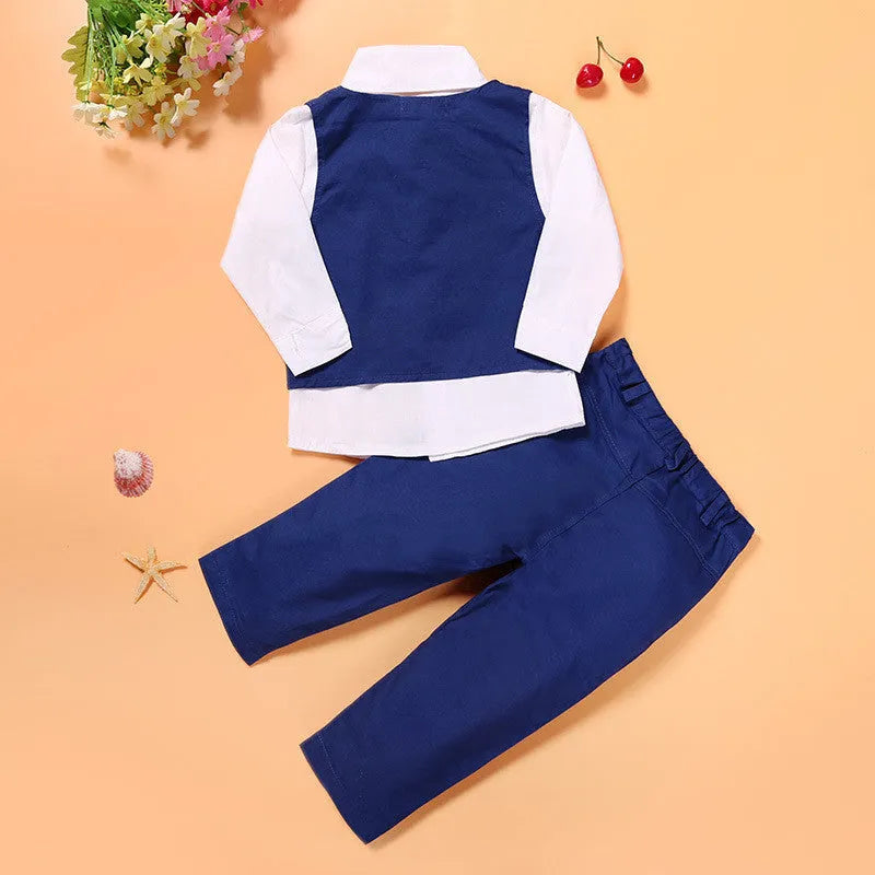 Blue boys' three-piece suit set with turtleneck, vest, trousers, and tie on a hanger.