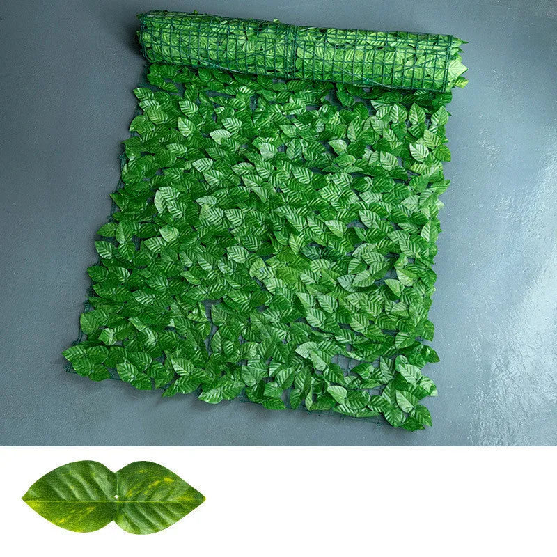 Green artificial radish leaf fence panel showing detailed plastic foliage for balcony and garden screening