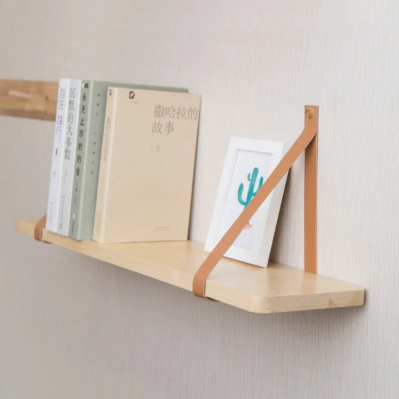 Pine wood wall mounted storage shelf in Nordic style for books and small items.