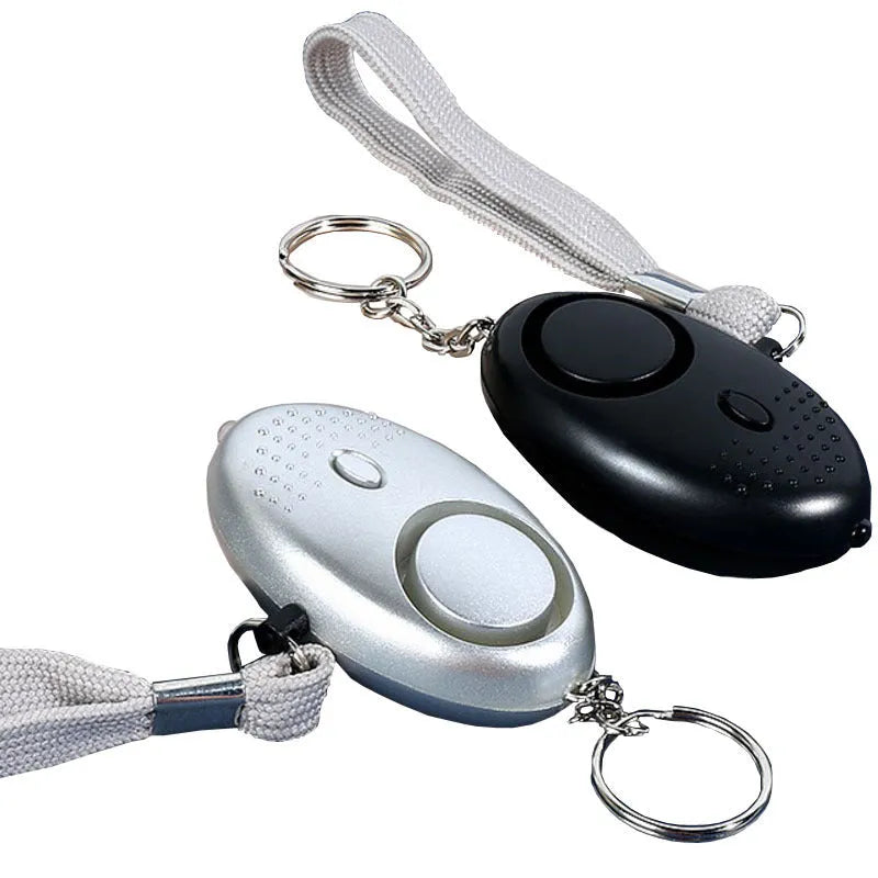 Personal security alarm with LED light in multiple colour options including black, pink and silver