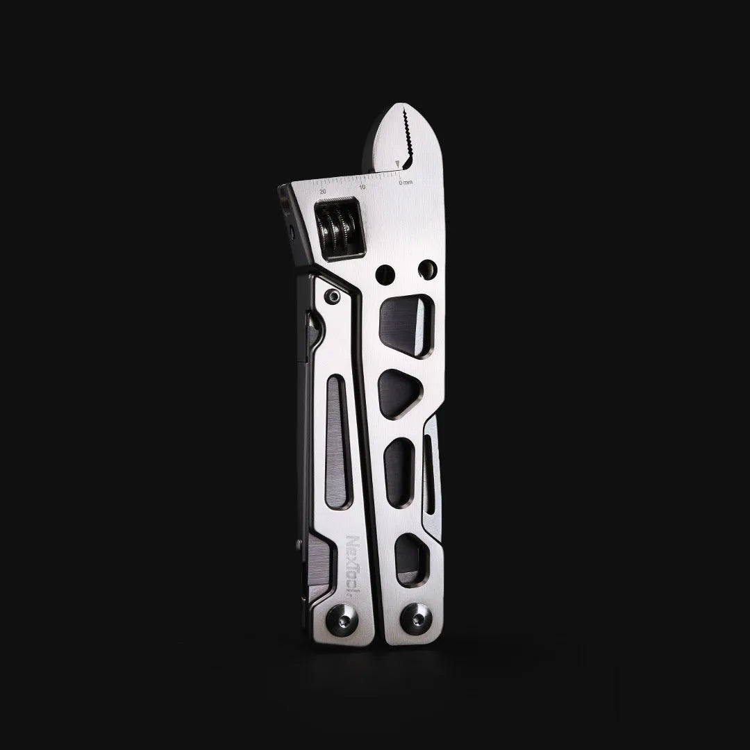 White stainless steel multi-function tool showing wrench, knife blade, and needle nose pliers design