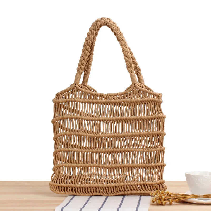Women's woven straw beach bag with square shape and double handles in natural texture