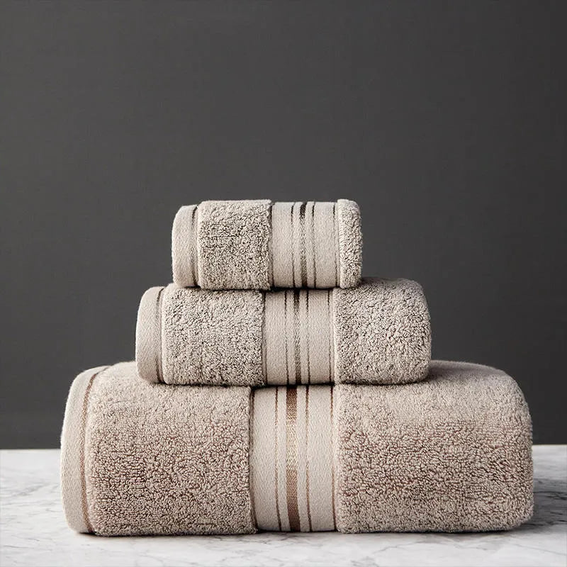 Pure cotton bath towel set in selected colour showing three towel sizes including large bath towel