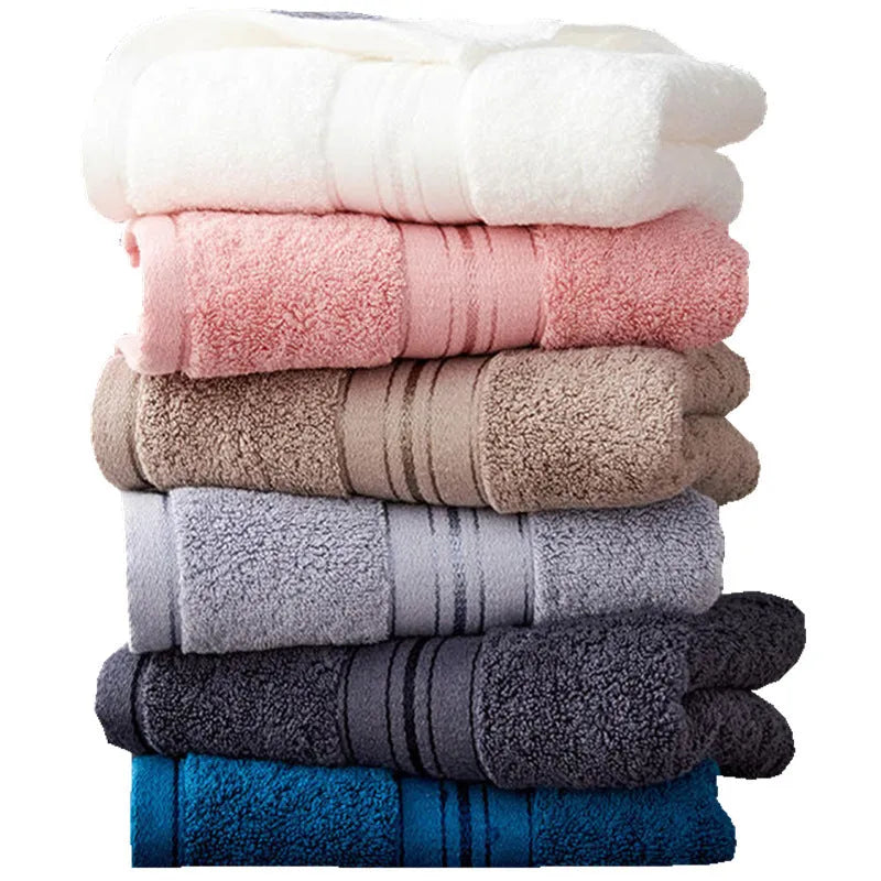 Pure cotton bath towel set in selected colour showing three towel sizes including large bath towel