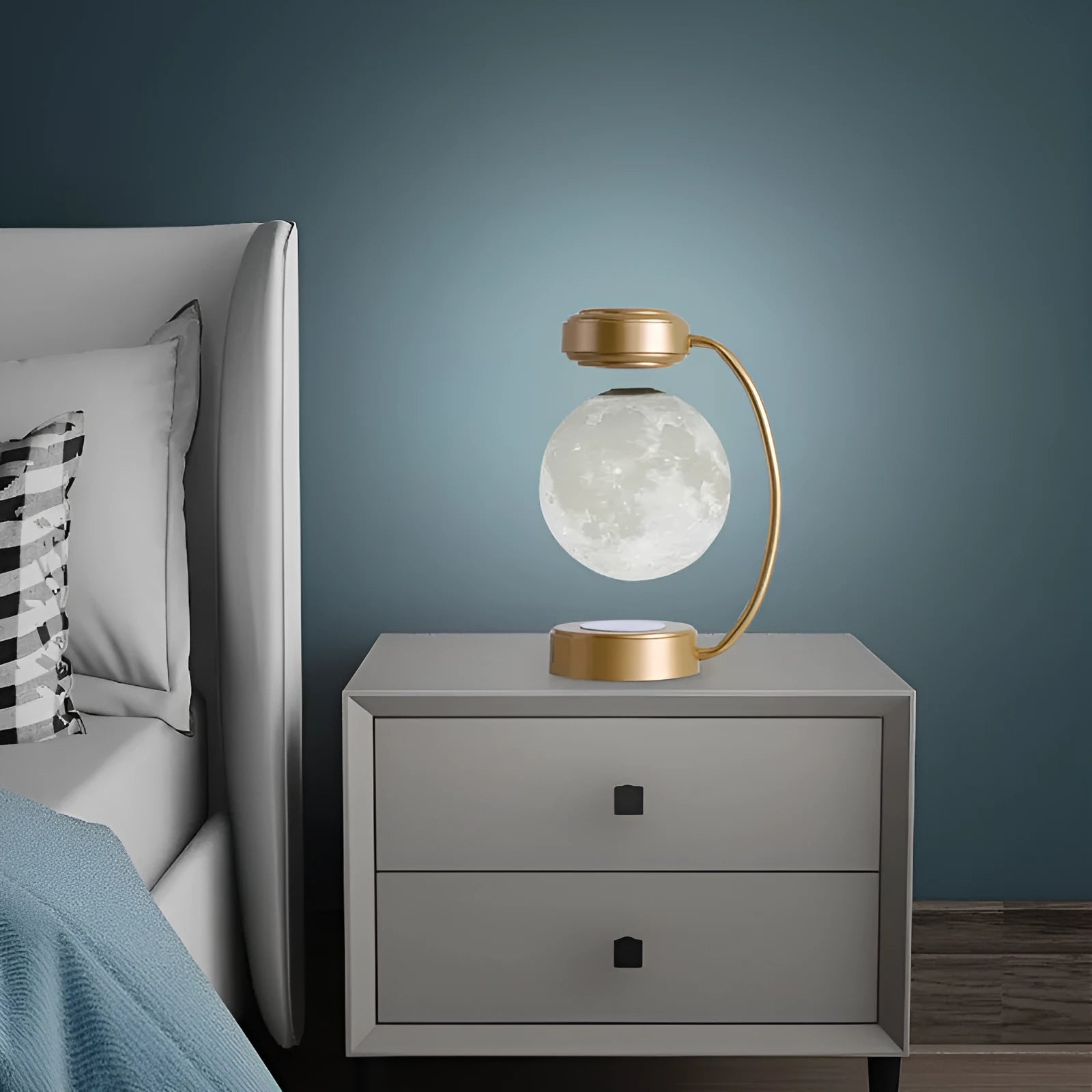 Magnetic levitation moon lamp with colour-changing light floating above base