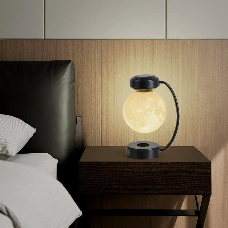 Magnetic levitation moon lamp with colour-changing light floating above base