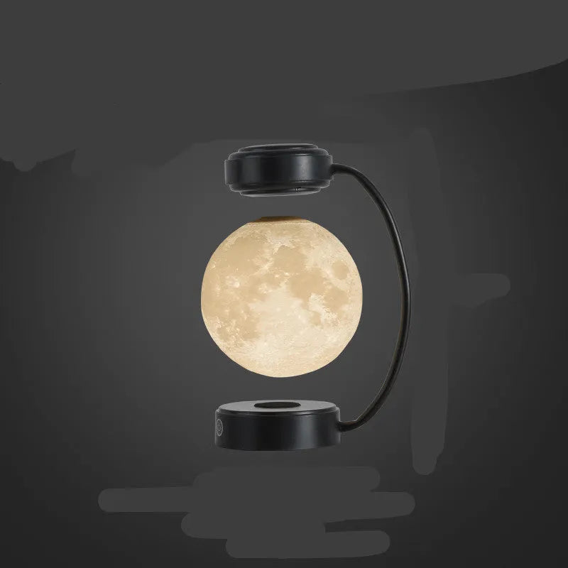 Magnetic levitation moon lamp with colour-changing light floating above base