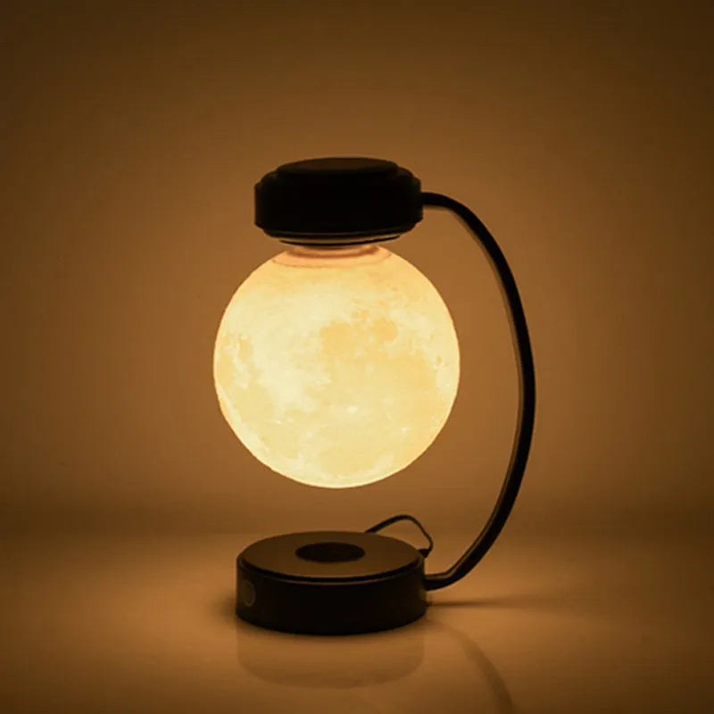 Magnetic levitation moon lamp with colour-changing light floating above base