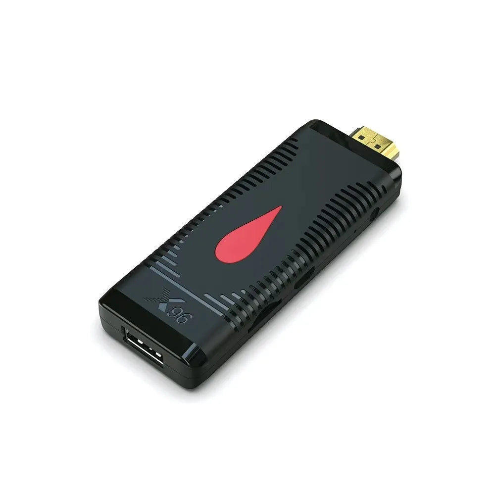 Compact smart TV set-top box with remote, cables, and memory card slots for expanded media storage