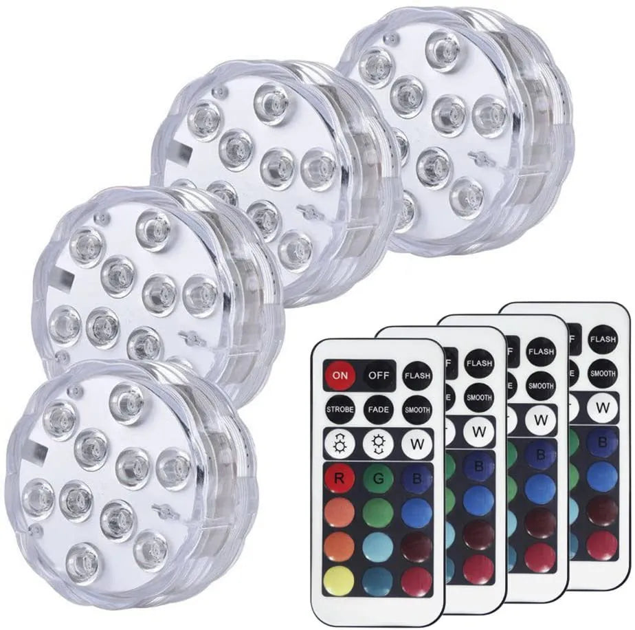 Round white remote control waterproof LED light with colour-changing LEDs for garden and pool decoration.