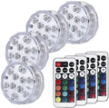 Round white remote control waterproof LED light with colour-changing LEDs for garden and pool decoration.
