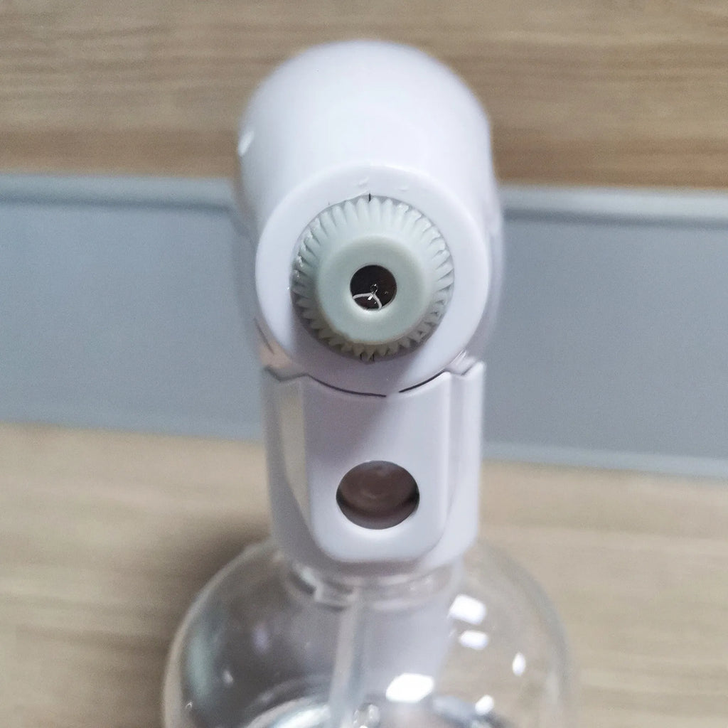 White handheld cordless spray disinfection gun with USB Type-C charging port and anti-blocking nozzle