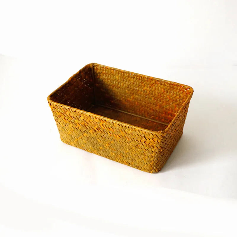 Natural straw desk storage organiser box for pens and cosmetics, shown in brown colour.