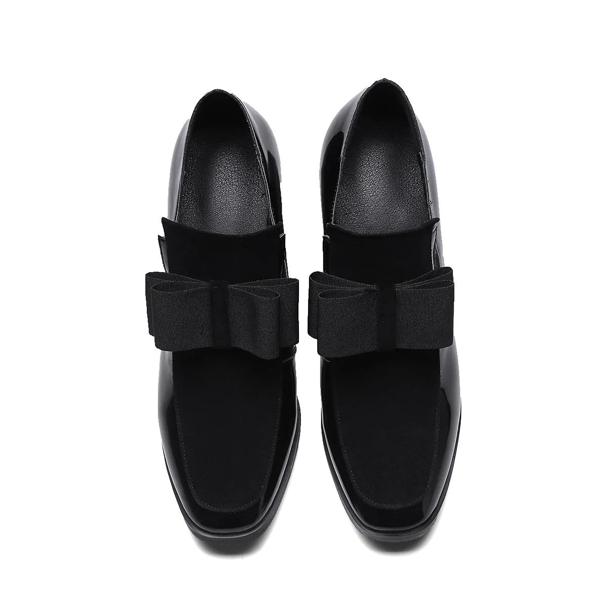Women's black patent leather high heels with 8cm thick heel and square toe design on wooden floor
