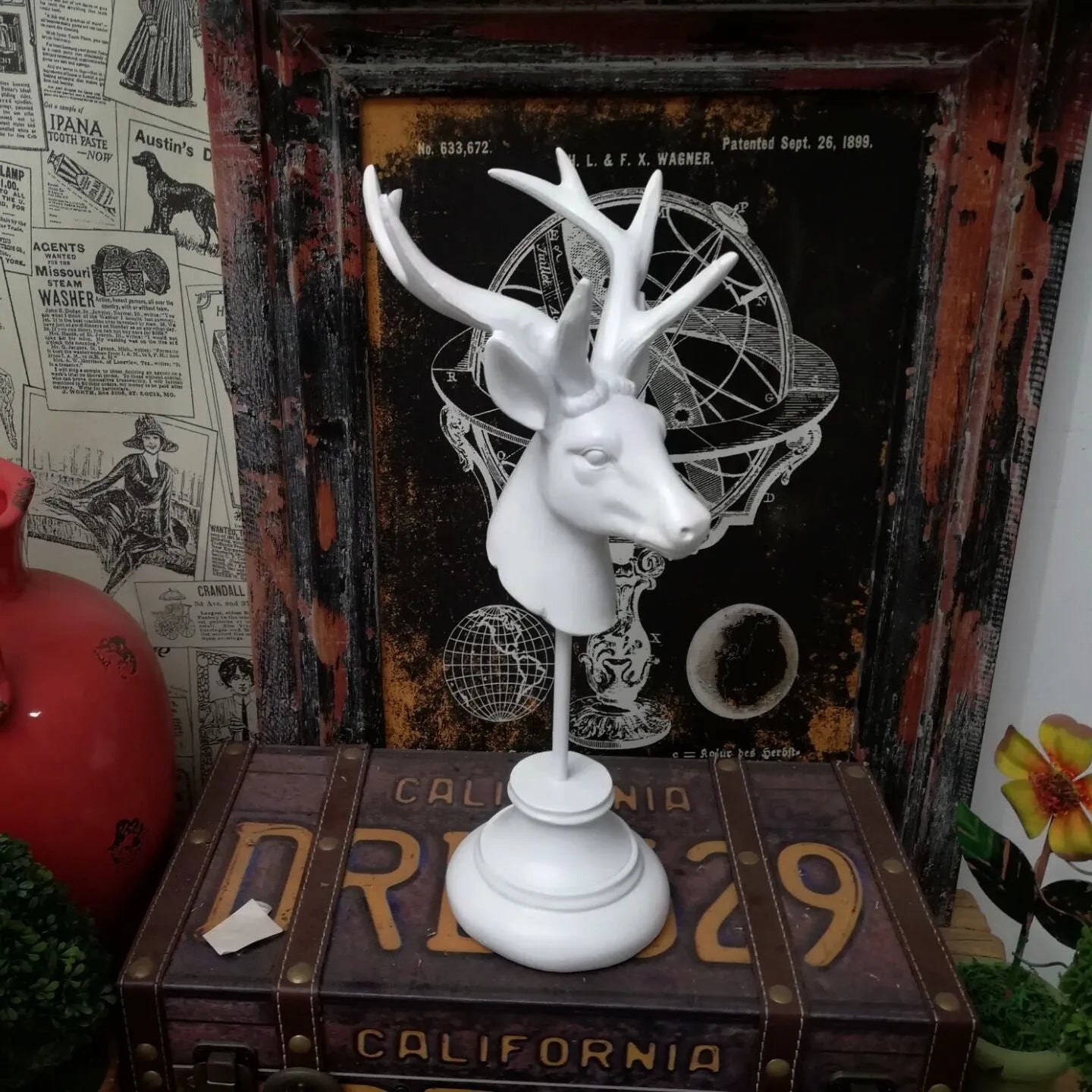 Natural resin animal ornament for home decor in black, white, or wood colour, 32cm tall.