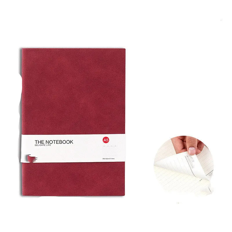 Simple solid-colour thickened notebook in green, dark blue, or orange red, shown in A5, A6, and B5 sizes.