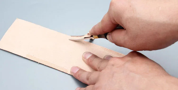 Leather hand tool for thinning wide shovel edges with 35cm blade length and sectional cutting design