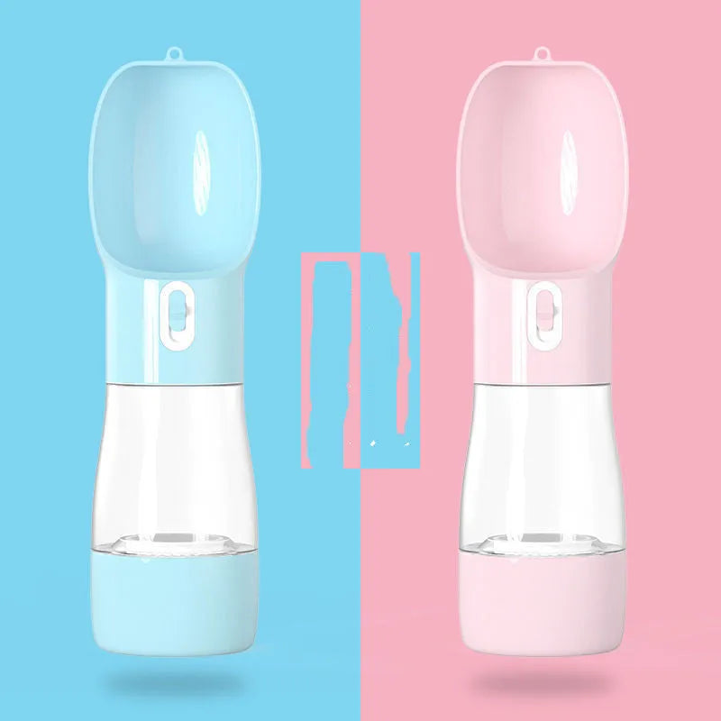 Blue portable dog water bottle with folding silicone bowl extended, showing carabiner clip.
