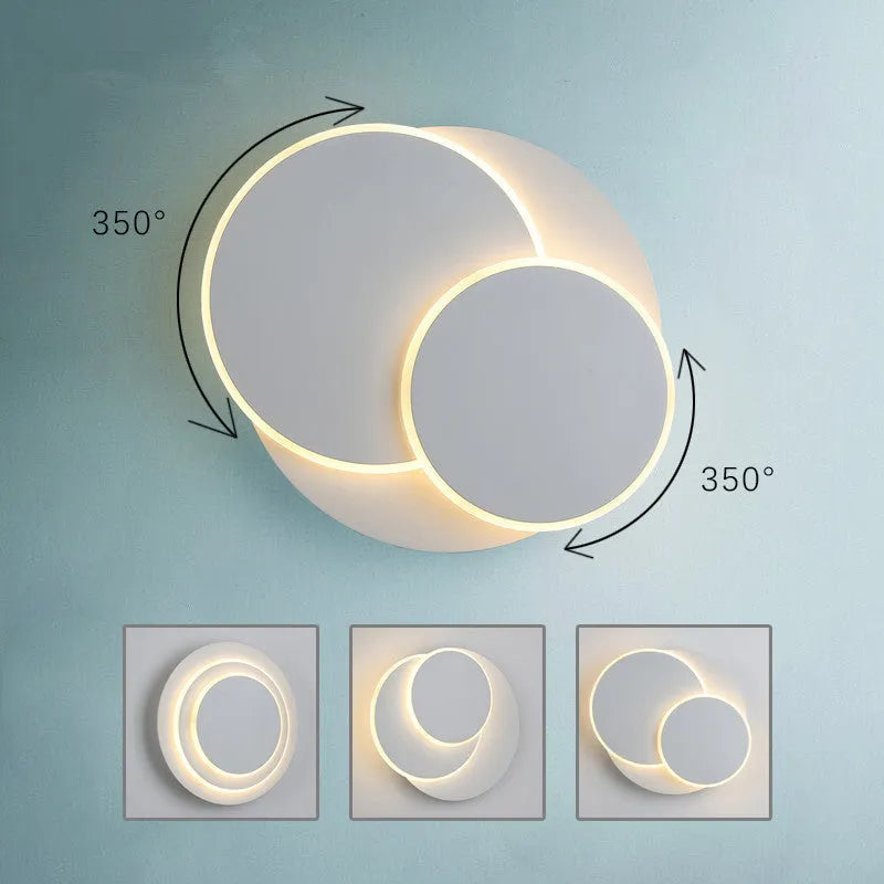 Round wall lamp with acrylic shade in black or white, available in 22cm, 18cm, and 14cm sizes for home lighting