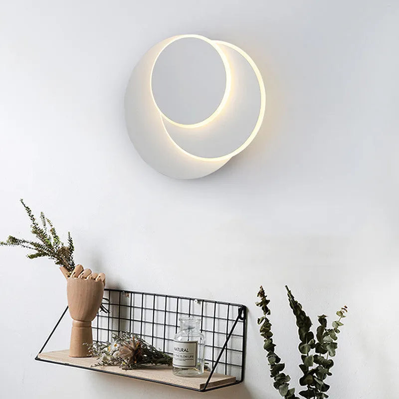 Round wall lamp with acrylic shade in black or white, available in 22cm, 18cm, and 14cm sizes for home lighting