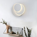 Round wall lamp with acrylic shade in black or white, available in 22cm, 18cm, and 14cm sizes for home lighting