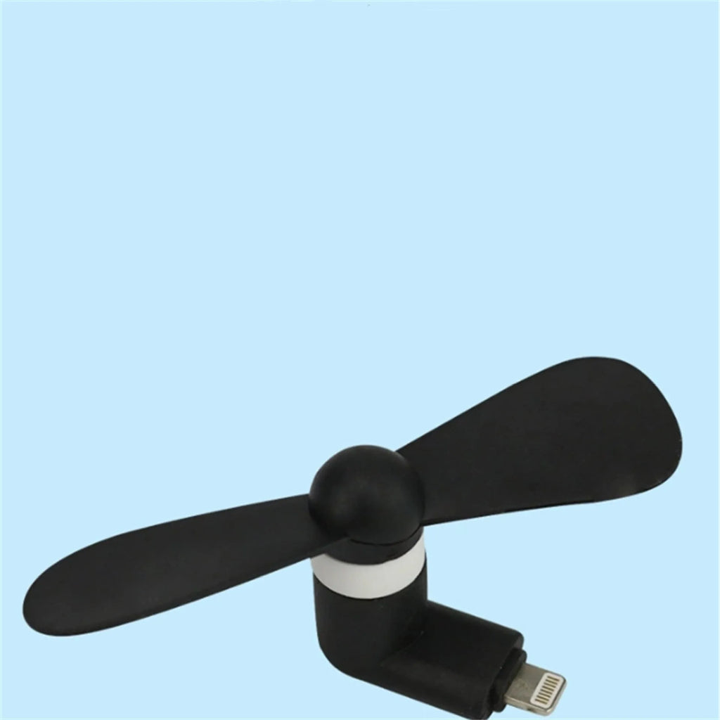 White portable mini fan with plastic blades and a rotary switch for mobile phones.