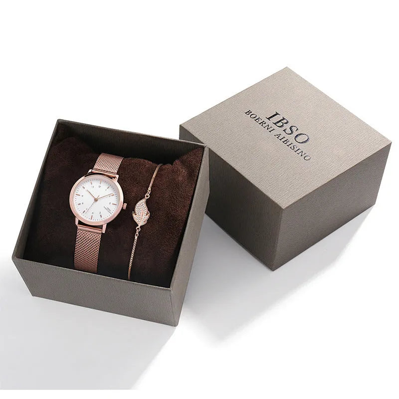 Women's rhinestone leaf bracelet watch set with 34mm round dial, alloy strap, and gold or silver finish