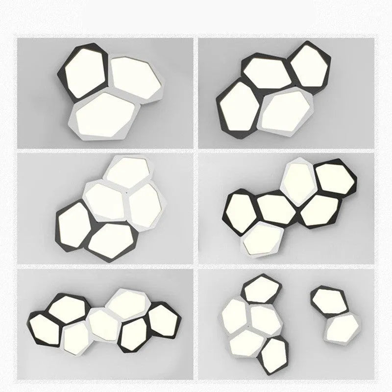 Geometric shaped LED light in black or white, measuring 380x260x80mm, with remote control for dimming