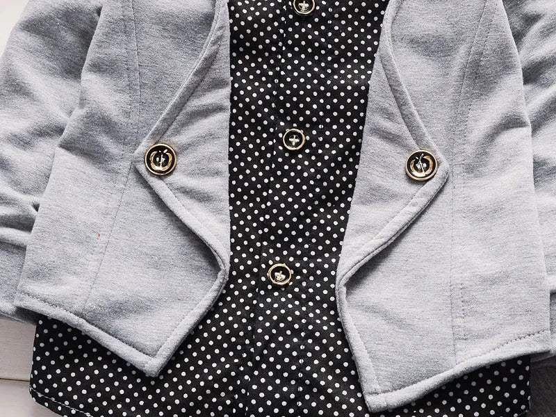 Toddler boy wearing a grey casual printed jacket and matching trousers suit set