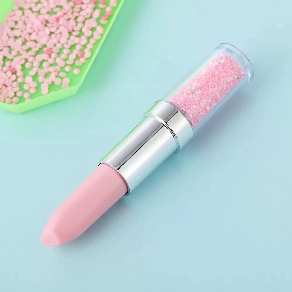 Plastic luminous point drill pen for diamond painting in green, pink, or purple colour options.
