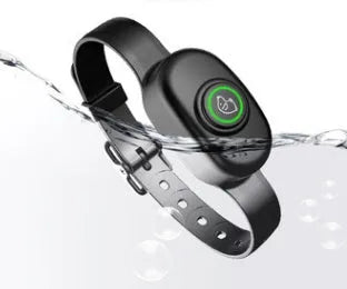 Black waterproof dog training collar with remote control showing shock, vibration and beep buttons