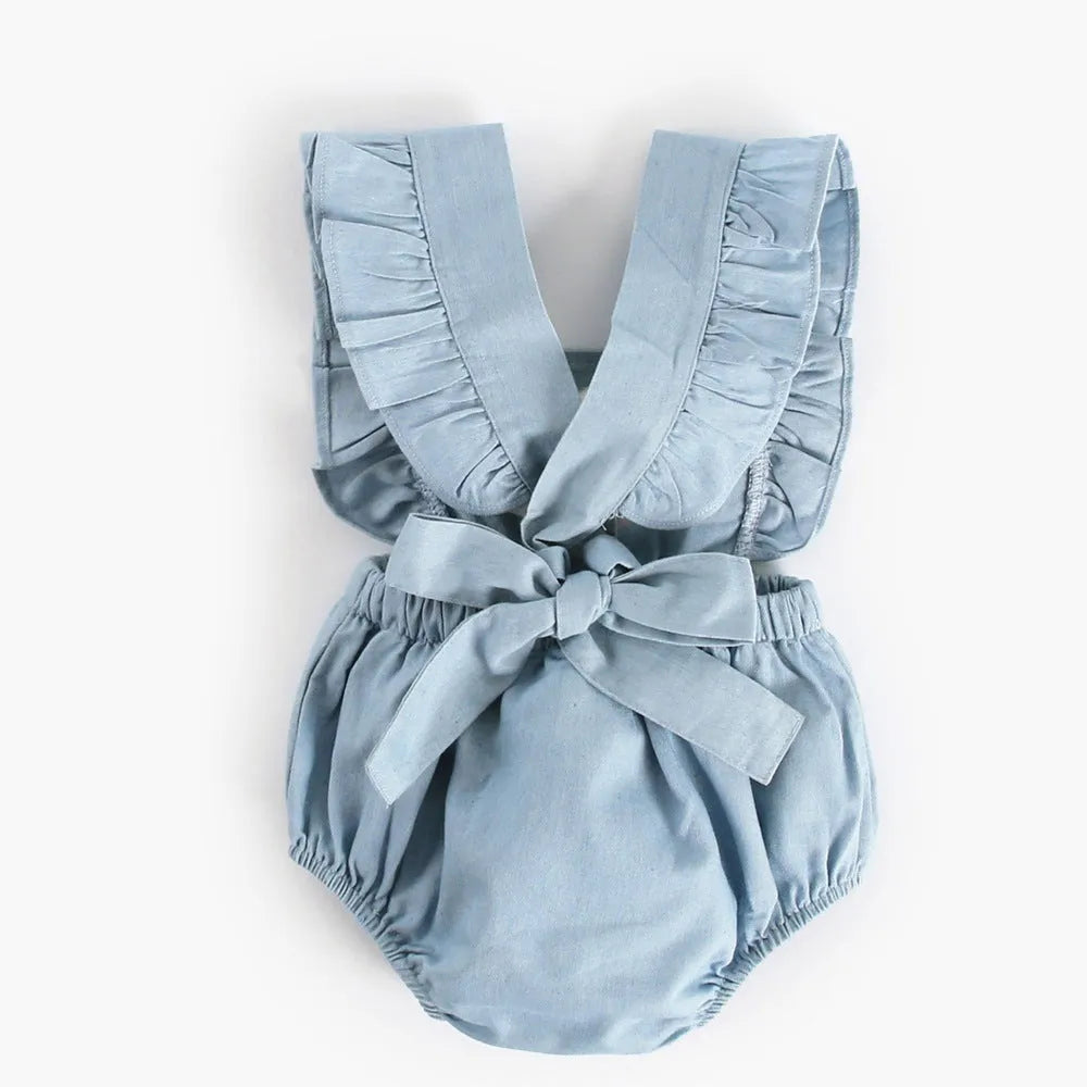 Blue denim lace sleeveless baby romper one-piece bodysuit on a hanger