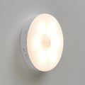 Wireless body sensing lights with rotation induction for automatic illumination in dark hallways and cabinets