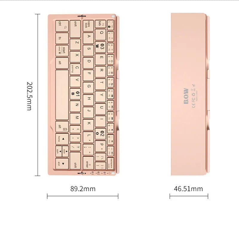 Silver white folding Bluetooth keyboard shown open with stand holding a smartphone, and folded next to a ruler for scale.