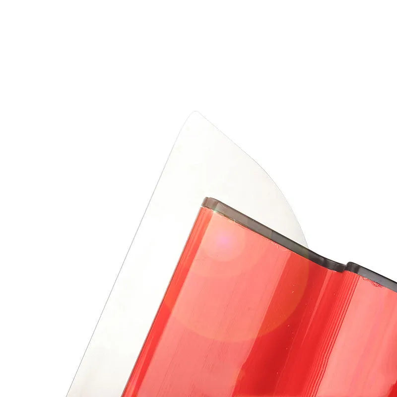 Red leveling scraper with 40cm blade for wall preparation tasks like putty removal