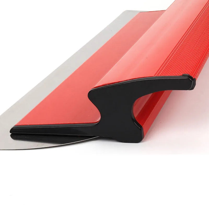 Red leveling scraper with 40cm blade for wall preparation tasks like putty removal