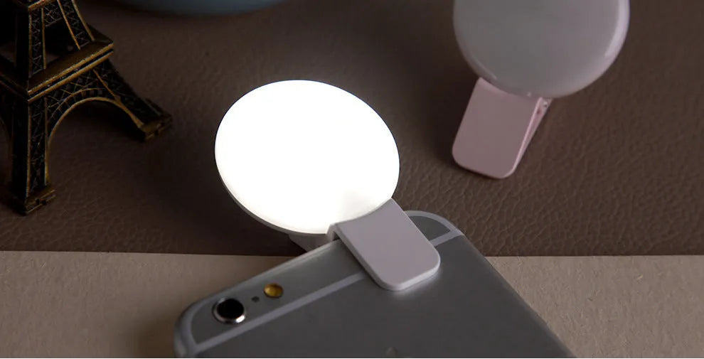Round makeup selfie fill light with mobile phone mount in black, pink, or white colour