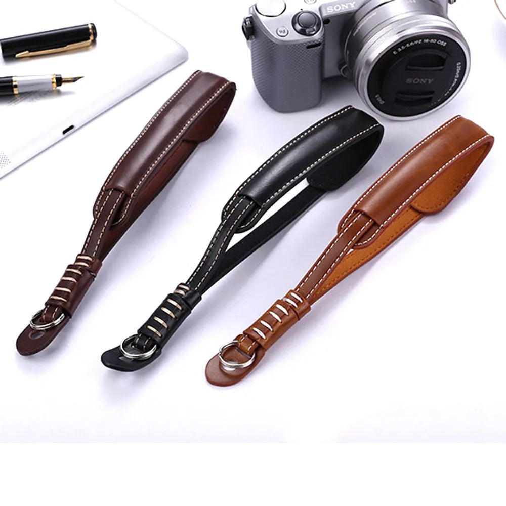 Black and brown camera wrist straps for digital SLR and mirrorless cameras with small mounting holes