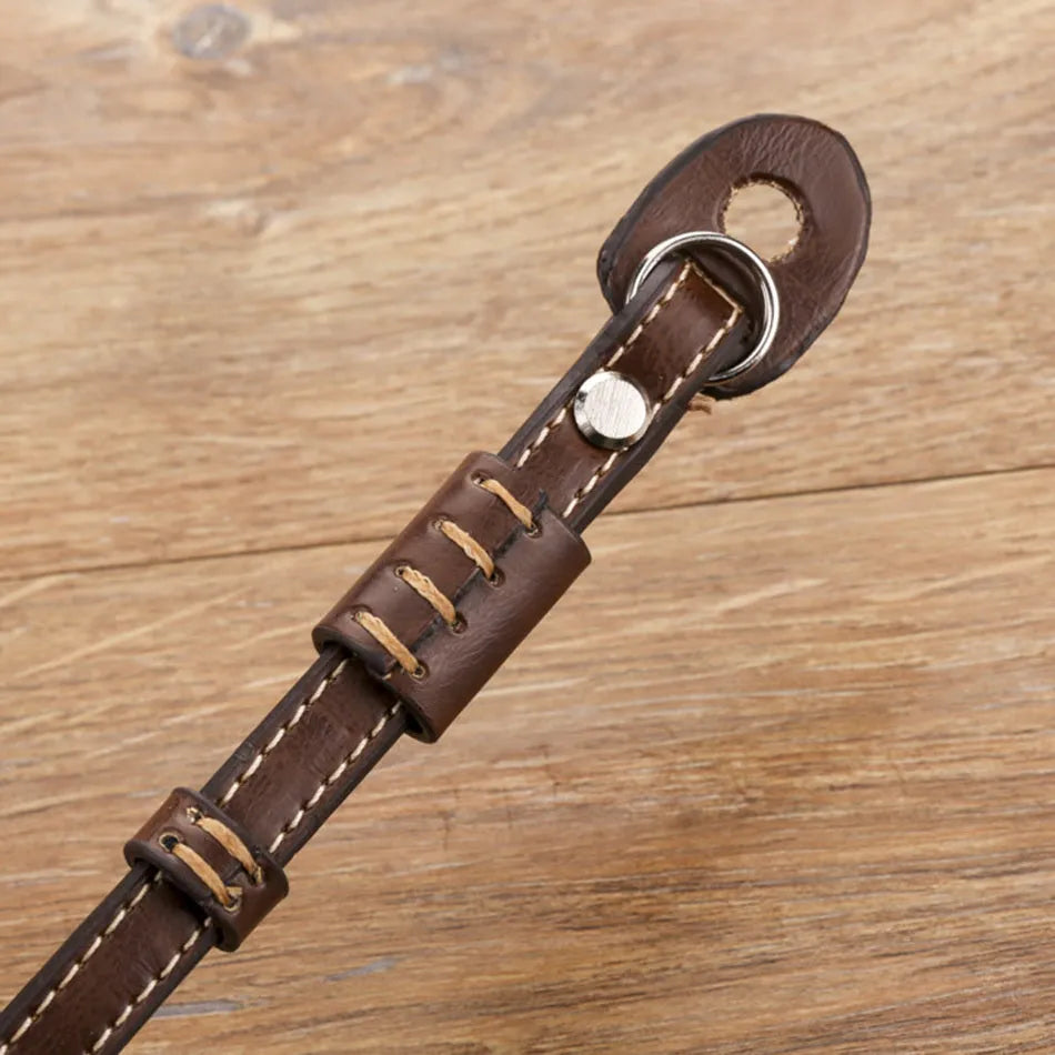 Black and brown camera wrist straps for digital SLR and mirrorless cameras with small mounting holes