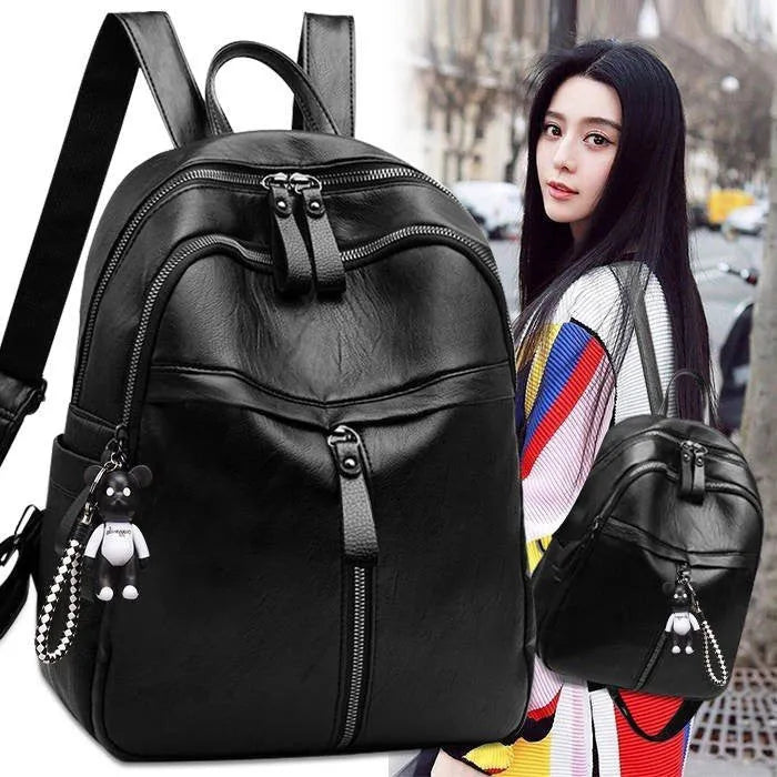 Black backpack with soft surface, double straps, and internal ID bag compartment showing 20-35L capacity